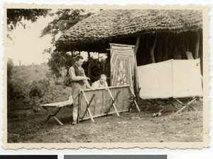 Setting up camp beds, Ethiopia