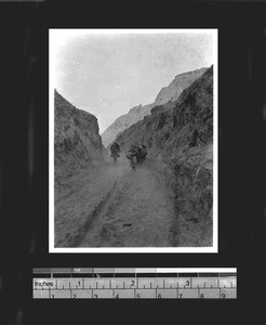 Travelers on mountain road through Eastern Shaanxi Province, China, ca.1926