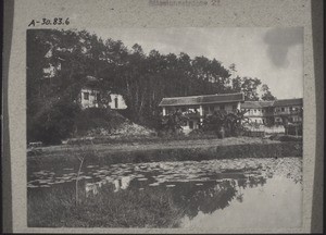 Mission station Tschonglok: view of the pastor's house and the chapel, seen from the school for bible women