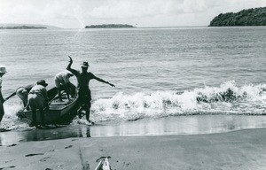 The chairman of the PEMS, Marc Boegner, getting out a boat