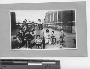 Children playing on a playground at Dalian, China