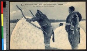 Man drawing a bow while hunting, ca.1920-1940