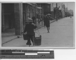 A street scene at Yangjian, China, 1925