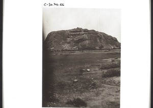 Cliffs, at the foot of which lies the town of Madura