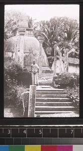 Buddhist priest outside the dagoba at Matale, Sri Lanka, s.d