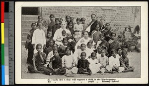 Women seated with numerous small children, India, ca.1920-1940