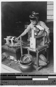 Japanese woman spinning silk, Japan, ca. 1920-1940