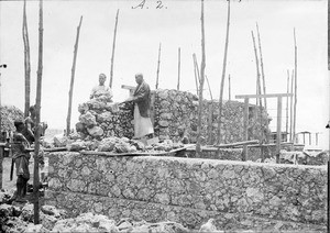 Africans building a house, Tanzania, ca.1893-1920