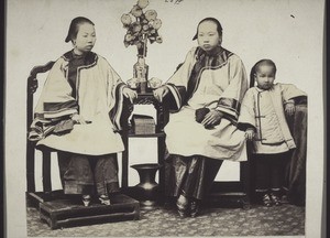 Two chinese women with a child