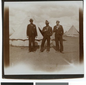 Three Boer men in front of a tent in the camp near Mafikeng, South Africa, ca.1901-1903