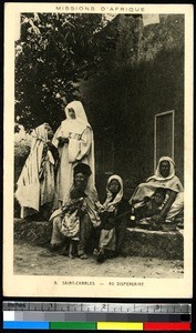 A missionary helping people at a dispensary, Algeria, ca.1920-1940