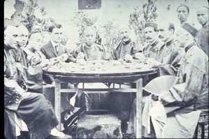 Group of Chinese and missionary men at a feast, Changde, Hunan, China, ca.1902