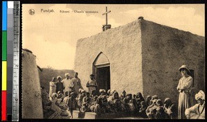 Indigenous people and a missionary in front of a secondary chapel, Punjab, India, ca.1920-1940