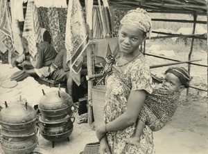 Woman with her child, in Oyem, Gabon