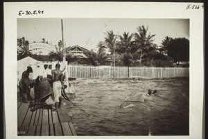 A boat which has sunk near the Mission Trading Company jetty