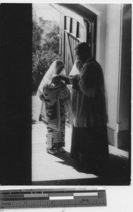 Fr. Ryan at baptism of Japanese baby at Dalian, China, 1938