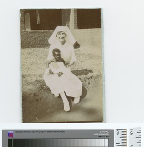 Miss Muir with Bryei's baby, Malawi, ca.1920-1929