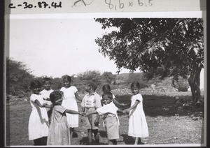 "Boarding school children and a cactus