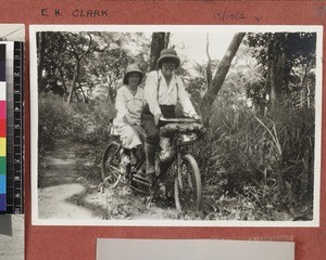 Missionary and wife on bicycle, Africa, ca. 1920