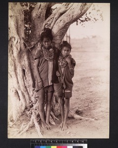 Portrait of two girls by tree, Myanmar. ca. 1890