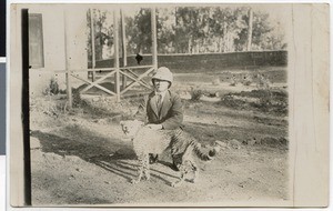 Missionary Böhm with female cheetah on a leash, Ethiopia, ca.1939-1940