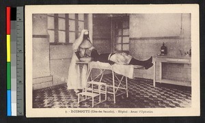 Indigenous nun preparing a man for an operation, Djibouti, ca.1920-1940