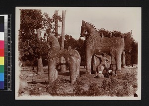 Child with horse statues, Tamil Nadu, India, ca. 1900