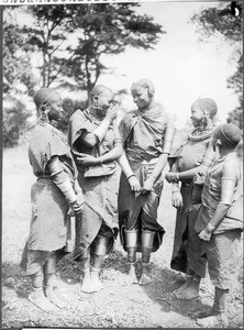 Arusha girls wearing hides and iron ornaments, Tanzania, ca. 1927-1938