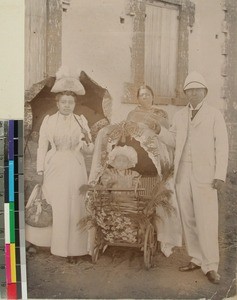 Presumably Rainijaonary, an officer, together with Mrs.Ravololona and child, Antsirabe(?), Madagascar, ca.1905(?)