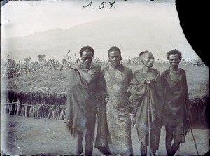 Four African young men, Tanzania, ca.1893-1920