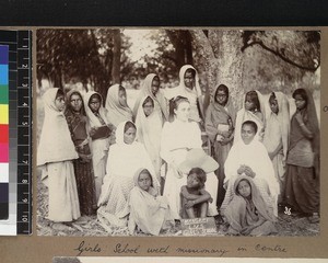 Female missionary with students of Girls' School, Mangari, India, ca. 1900-1910