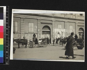 Streetscene with placards, Wuhan, China, March 1927