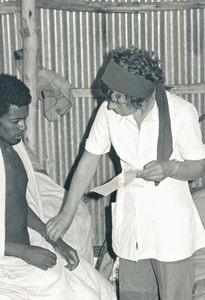 Ethiopia, the Bale Province. From the Melka Oda camp, 1980. Nurse Lisbeth Andreasen examining a