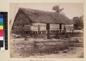 View of men and boys outside church, Tupuseleia, Papua New Guinea, ca. 1890