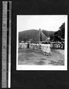 Maypole dancers on Founders' Day, Fukien Christian University, Fuzhou, Fujian, China, 1948