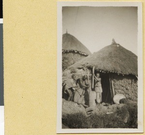 Women pounding grain, Ethiopia