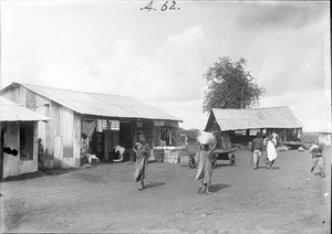 People in front of Indian shops, Tanzania, ca.1893-1920