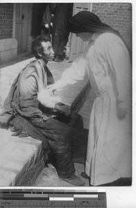 Sister M. Mercedes at dispensary at Fushun, China, 1937