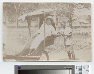 Miss Muir in the bush car, Malawi, ca.1920-1929