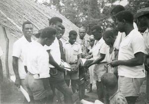 Okaghesi, books'sale during a tour of evangelization, in Oyem, Gabon