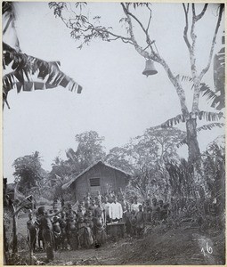 A railway bell of Württemberg used as a church bell and hanging in a tree