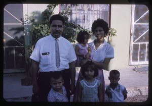 Family outside their home