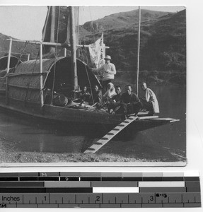 Fr. Burns in a boat to Luoding, China, 1924