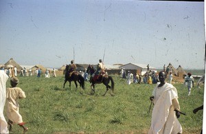 Riding men and others, Cameroon, 1953-1968