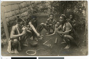 Young Zulu men smoking cannabis, South Africa