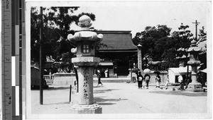 People near a horse statue, Japan, ca. 1920-1940