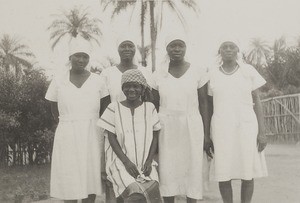 Four female nurses and patient, Nigeria, 1934