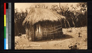 Small thatch-roofed building constructed of sticks, Angola, ca.1920-1940