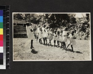 Group of girls singing and dancing, West Indies, ca. 1930