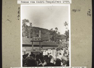 Scene from the Kadri temple festival. A figure is suspended in the air in the rear (Garuda). According to Indian mythology Krishna once rode on this bird